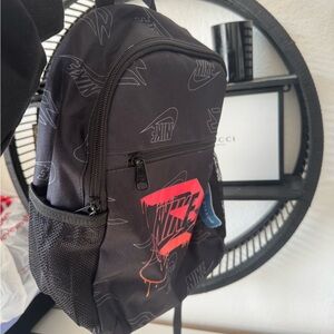 Nike Black Backpack with Bold Red Logo